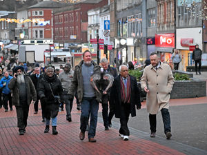 Supporting image for story: Community comes together for walk of reflection and peace