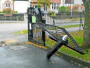 Supporting image for story: Stolen car smashes through park gates