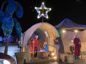 Supporting image for story: Drive-through Nativity brings joy to town
