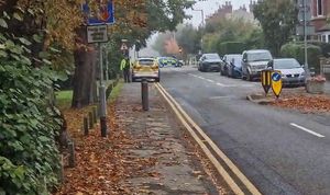 Police in Corporation Street, Stafford, after two children were pronounced dead early on Sunday