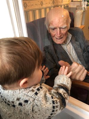 Archie meeting his great-great-grandfather for the first time through the visiting pod at Cliffdale Residential Home