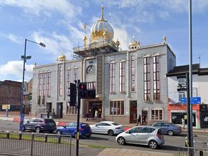 Supporting image for story: Gurdwara lit up purple for domestic violence awareness