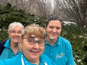 'The cooks' at Severn Hospice, enjoying a brief break in the snow. Photo: Linda Jones