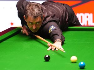 Ronnie O'Sullivan lines up a shot