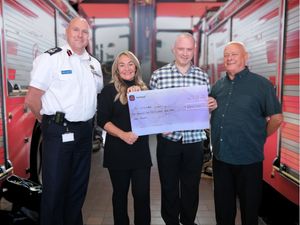 Supporting image for story: Chief fire officer 'staggered' by £2,500 donation from Shrewsbury darts league