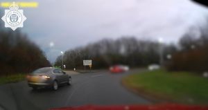 Keith Evans drives away after clipping the Toyota Rav 4. Picture: West Mercia Police
