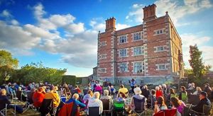  British Touring Shakespeare brings A Midsummer Night's Dream to Soulton Hall’s historic Epidaurus Court, where live theatre returns after hundreds of years. The performance seamlessly blends the enchanting world of the play with the historic beauty of the hall.