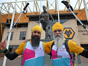 Supporting image for story: Wolves super fan's fundraising efforts marked by re-release of video which can be seen by millions