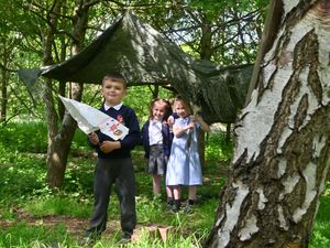 Pupils at Greenacres love their expansive forest school area. Cohen Jay (front) with Zoe Lowe (back right) and Myla Braddick.