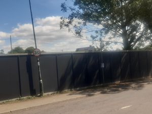 This sign advertising the Oxon Park & Ride site can hardly be seen. Picture: LDRS