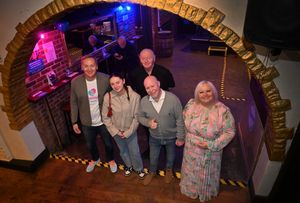 Andy Pearce, Izzy Pearce, Rob Bradley, Dave Holloway and Debbie Lloyd pose inside the Cavern section