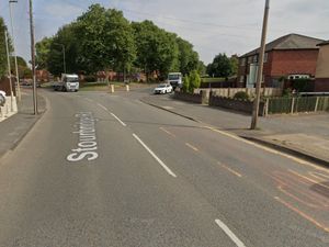 Supporting image for story: Man walks away with minor injuries after crash between motorcycle and car