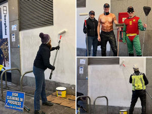 Supporting image for story: Clean-up volunteers including 'The Sign Guy' give Shrewsbury Market Hall entrance a fresh new look