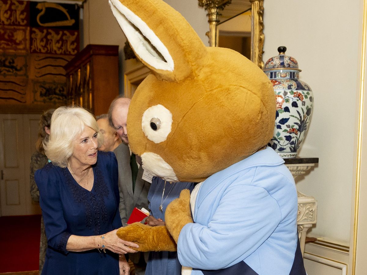Queen meets Peter Rabbit as she wishes reading charity &lsquo;happy 100th birthday&rsquo;