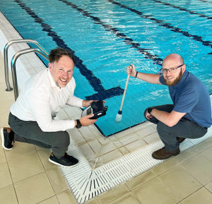 SLT Head of Operations  Mark Wildman (left) and SLT Facilities Manager Graham Berry, carrying out maintenance checks poolside at Tipton Leisure Centre