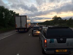 Both westbound lanes were closed as well as one eastbound