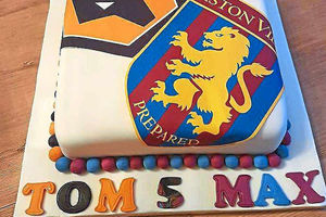 A birthday cake of two halves