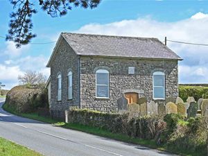 Supporting image for story: A stained glass artist wants to turn a Powys Victorian stone chapel into a home where he can display his work