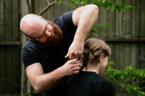 Brooke's dad, Ben, did the honours of shaving her head on Saturday afternoon
