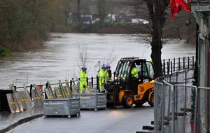 Workers from the Environment Agency spent Wednesday setting up flood barriers