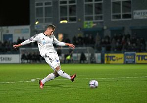 Adam Farrell of AFC Telford United scores a goal to make it 1-0 to AFC Telford United