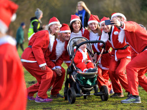 Supporting image for story: Hundreds turn out for Acorns Santa Run in Walsall