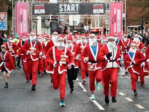 Supporting image for story: Oswestry Santa Run raises £1,400 for cancer charity