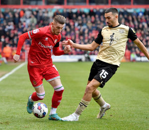 Walsall's Tom Knowles and Orient's Idris El Mizouni