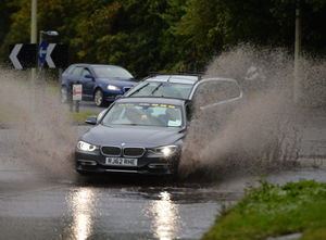 Drivers brave the rain on Cannock Road in Essington