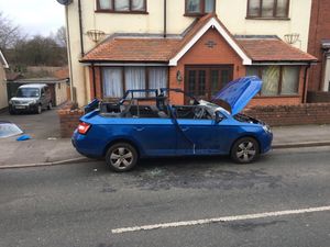 Firefighters cut off the top of the vehicle. Photo: @StaffsFire