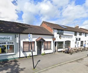 The Stables in Craven Arms plans to expand into the former hairdressers next door (Google)