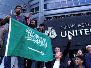 Supporting image for story: Newcastle fans party outside stadium as Saudi takeover confirmed