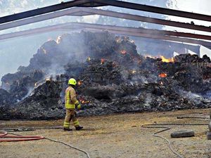 Supporting image for story: Two hay barns destroyed by fierce blaze as crews continue to damp down