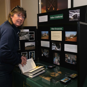 Niki Scott, Centenary Chair looking through some of the items on display. Image by Andy Compton
