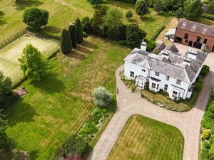 Supporting image for story: Period home with expansive grounds, tennis court and separate red brick barn is listed for sale