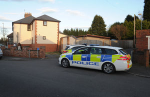 Police block the entrance at Glebe Place, Darlaston, following reports of a bomb being found