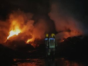 Supporting image for story: Calls to publish report into major fire at Chirk Kronospan factory almost three years on