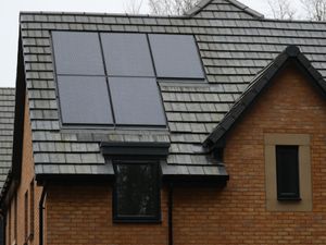 A house roof with solar panels