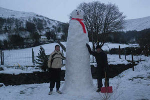 Supporting image for story: Walking in the air with 12ft snowman