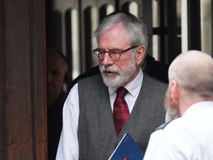 Supporting image for story: Gerry Adams arrives at High Court for bombings trial