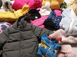 Examples of warm winter clothing that Little Stars Baby Bank will provide to families in need across Shropshire