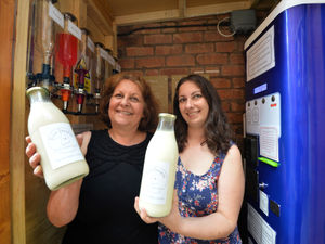 Supporting image for story: Milk vending machine a hit in market town as farmers fulfil dream