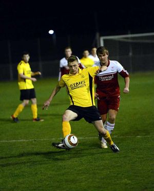 Ellesmere's Sean Griffiths and Wem's Chris Jeavons.
