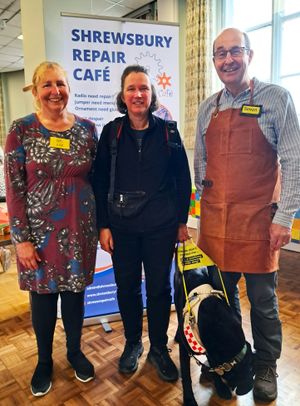 Liz and Simon welcome Lottie and her guide dog Olive to the repair cafe
