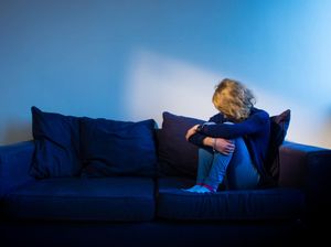 Woman on sofa