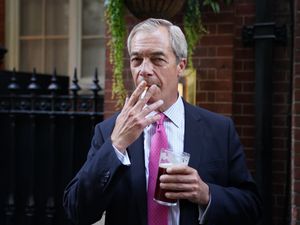 Supporting image for story: Smokers ‘heroes of the nation’, says Farage as he lights up cigarette near pub