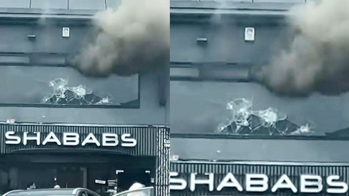 West Midlands: Dramatic moment hero passersby hurl rocks at window of burning building to free staff
