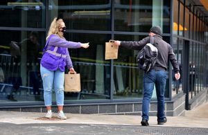 Facemasks being handed out at Wolverhampton Railway Station