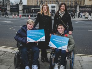 Emily Reuben with son Eli and Alex Johnson with son Jack, all outside the Houses of Parliament