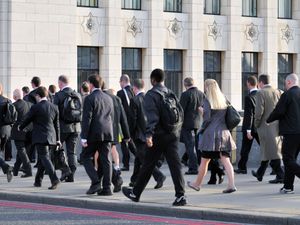 Morning rush Hour commuters walking, London Bridge, London, United Kingdom